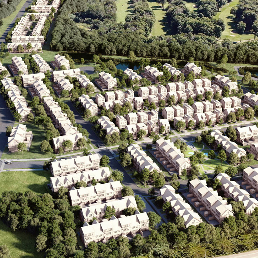 Vue aérienne d’un quartier résidentiel avec rangées de maisons, pelouses vertes et arbres environnants.